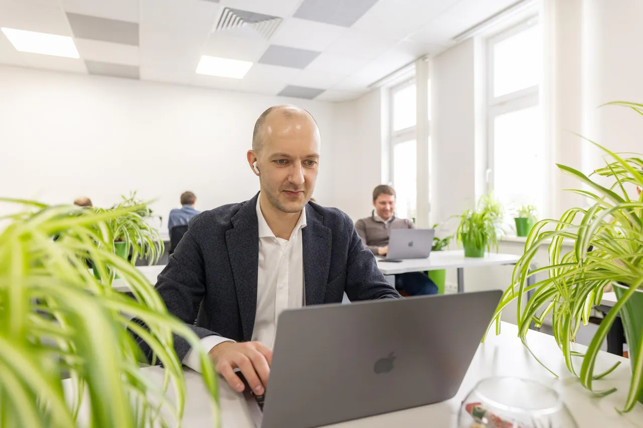 A LITSLINK engineer at work in the office