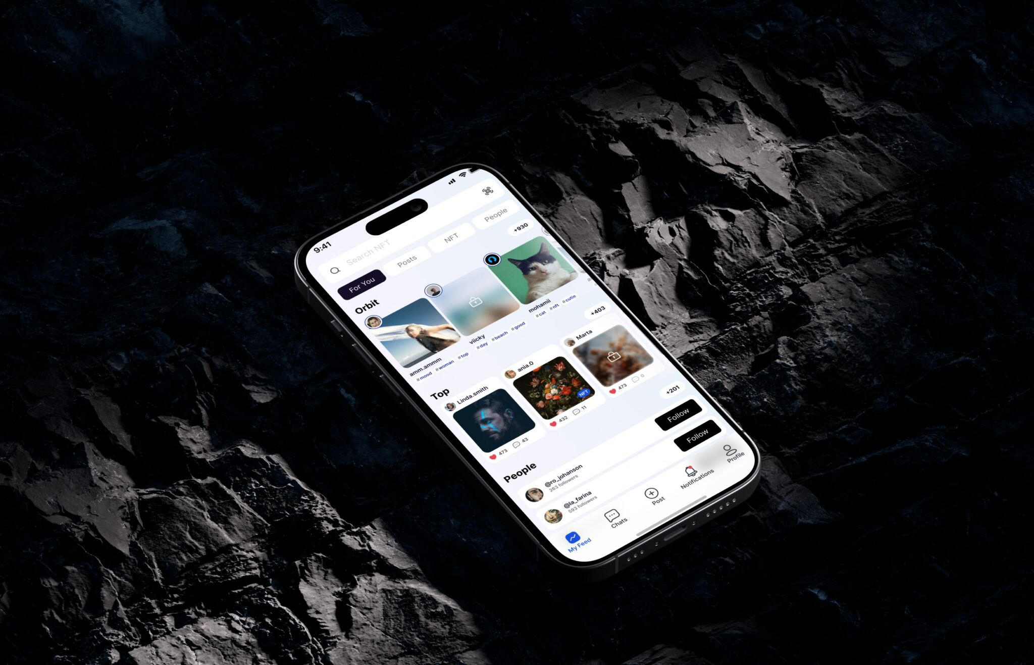 Phone on a dark rock showing the BitOrbit social feed for content creators
