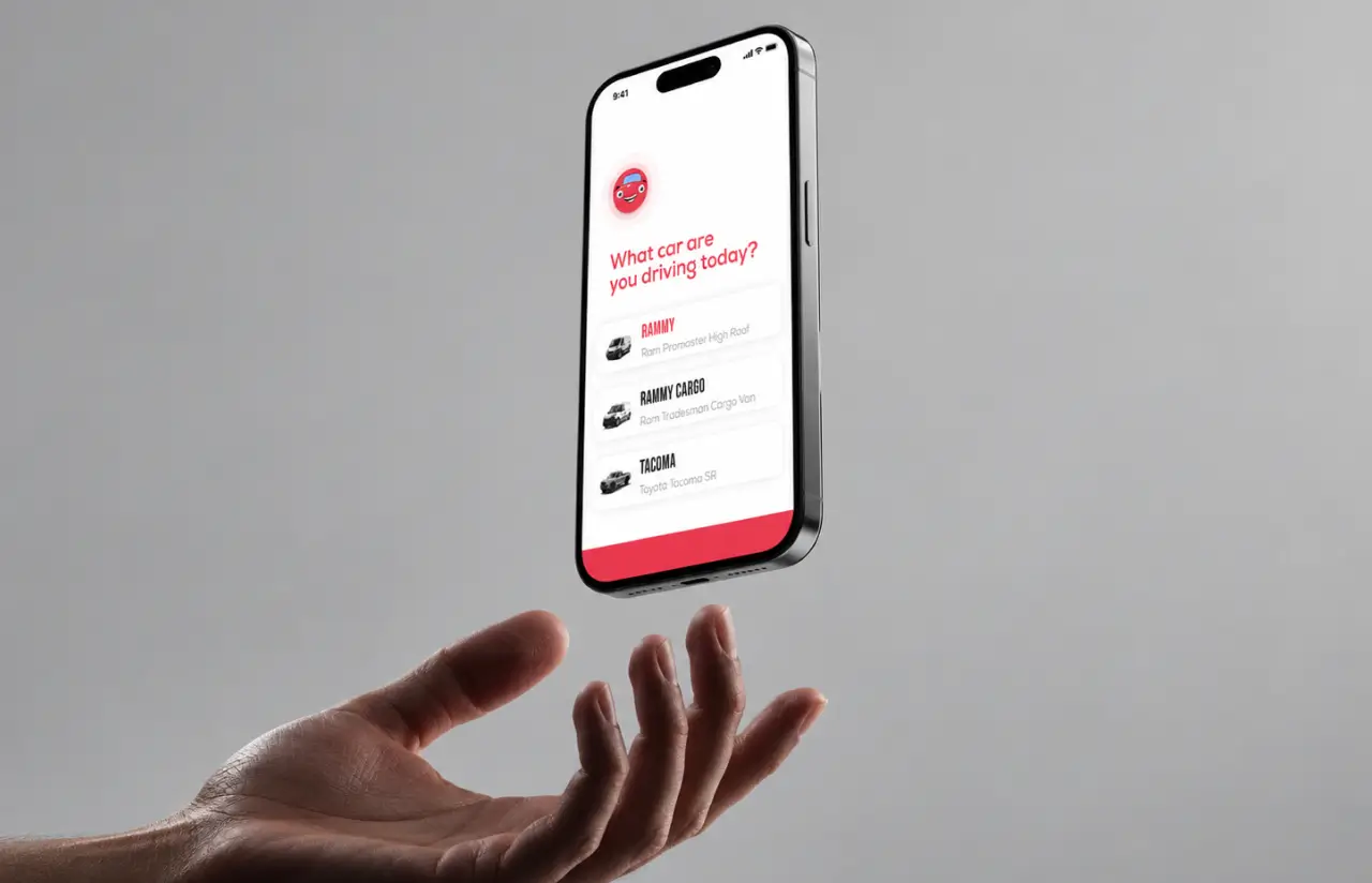 Phone floating above a hand, showing the driver app question which car are you driving today with three vehicle cards