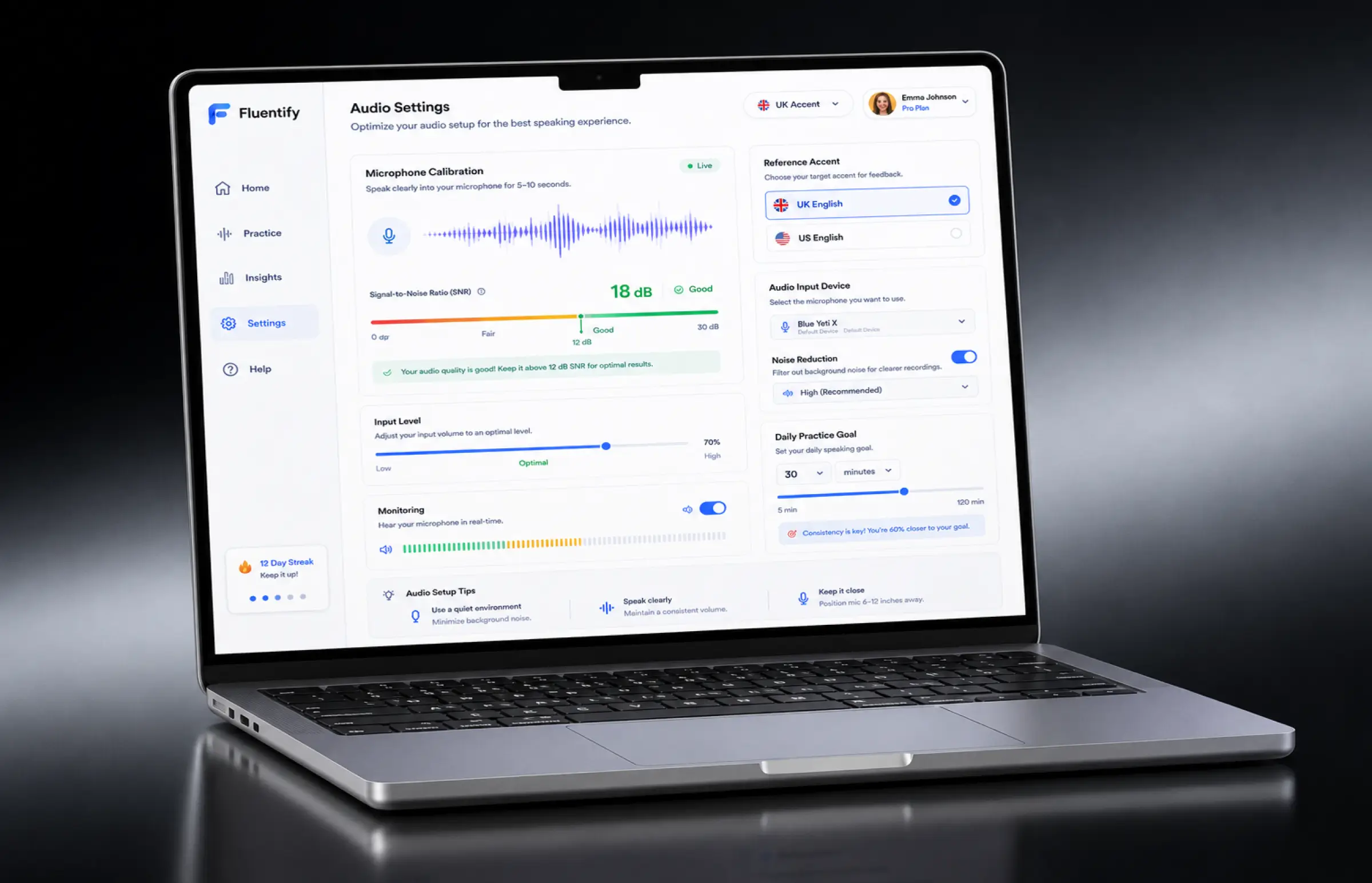 Laptop showing Fluentify audio settings: microphone calibration with a live waveform and a signal-to-noise ratio of 18 dB marked good, input level and monitoring controls, a reference accent choice between UK and US English, the audio input device and noise reduction