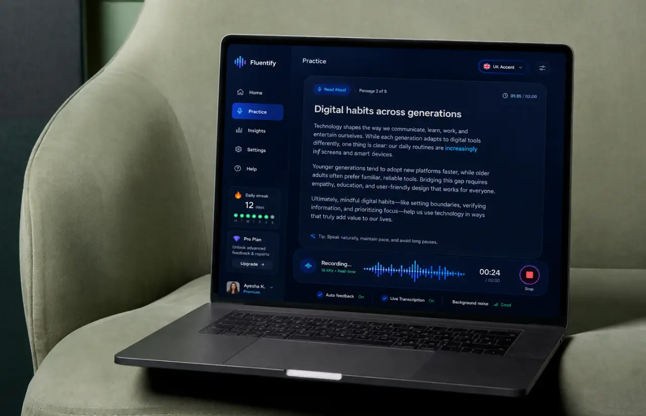 Laptop on a chair showing the Fluentify practice screen with the reading passage, the UK accent selector, a live recording waveform and the auto feedback and live transcription toggles