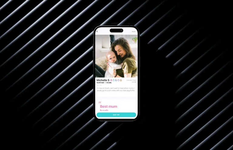 Mush app profile of a mother holding her baby, with the children's ages, location and a short bio