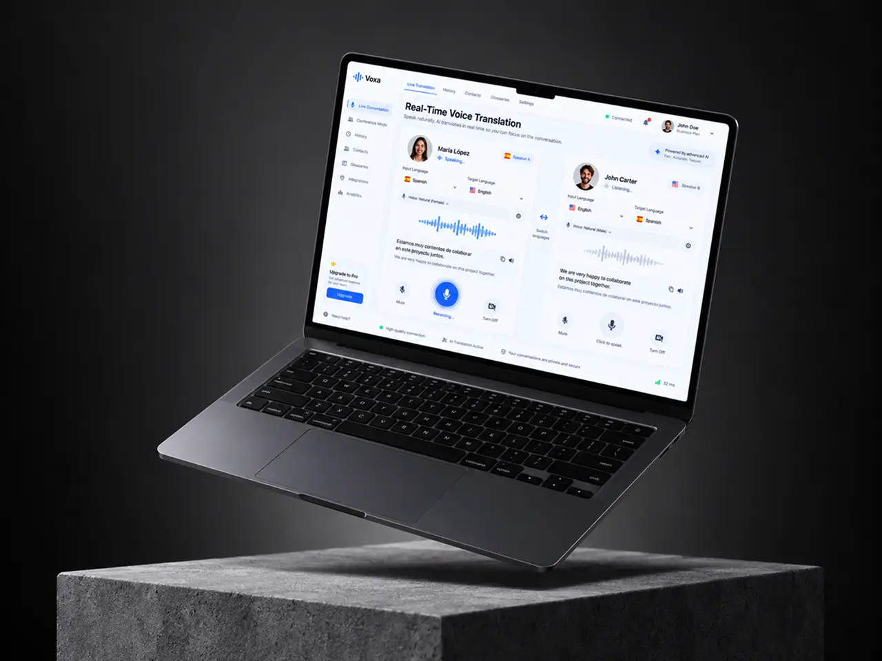 Live translation screen on a laptop with two speakers translating between Spanish and English