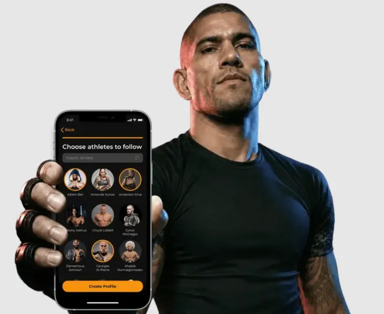 A man in a black training shirt holds out a phone showing a screen headed “Choose athletes to follow”: a search field above a grid of circular athlete portraits with their names, and a Create Profile button at the bottom.