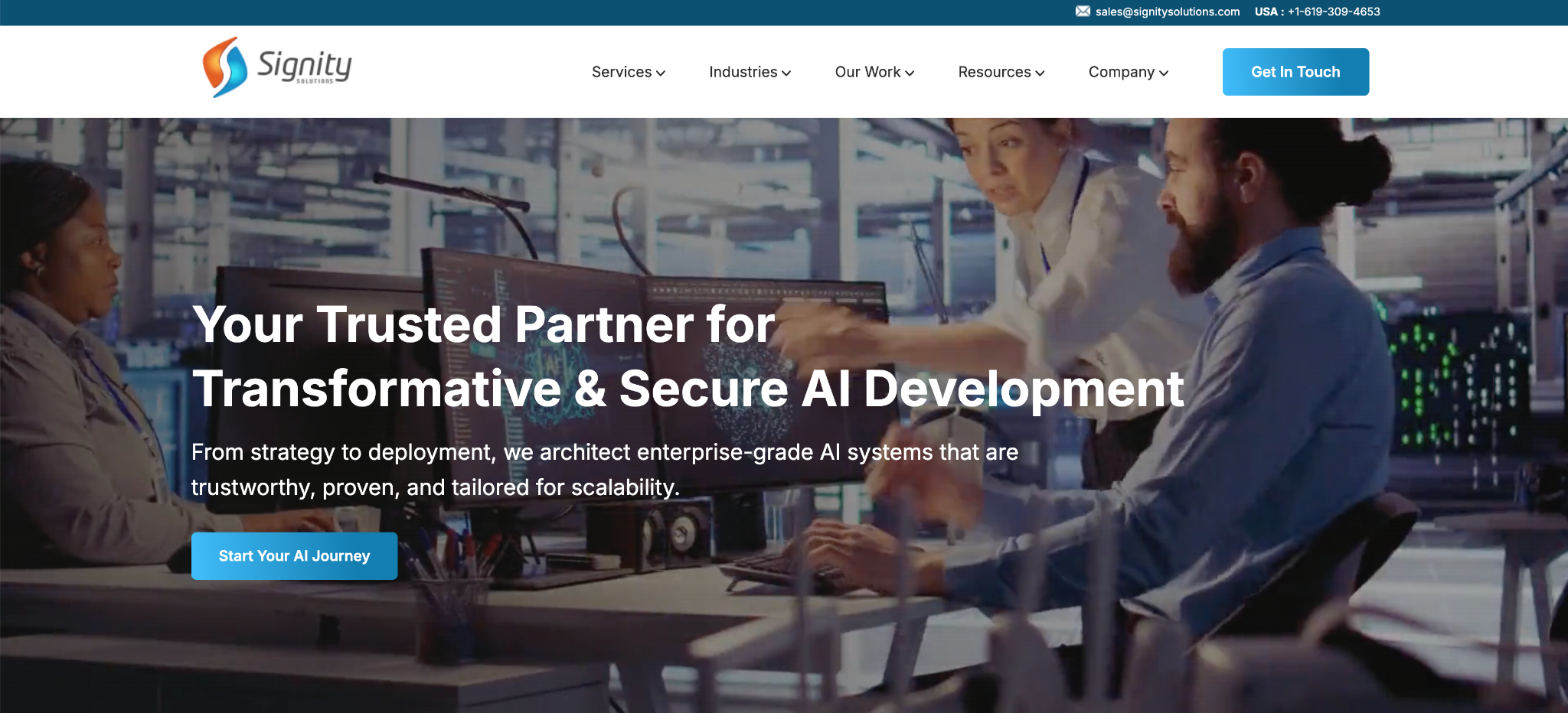 Signity Solutions homepage: "Your Trusted Partner for Transformative & Secure AI Development", over a photo of colleagues at a monitor.